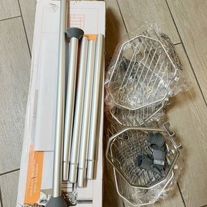 Squared Away™

NeverRust® Aluminum

4-Tier Shower Caddy in

Satin Chrome